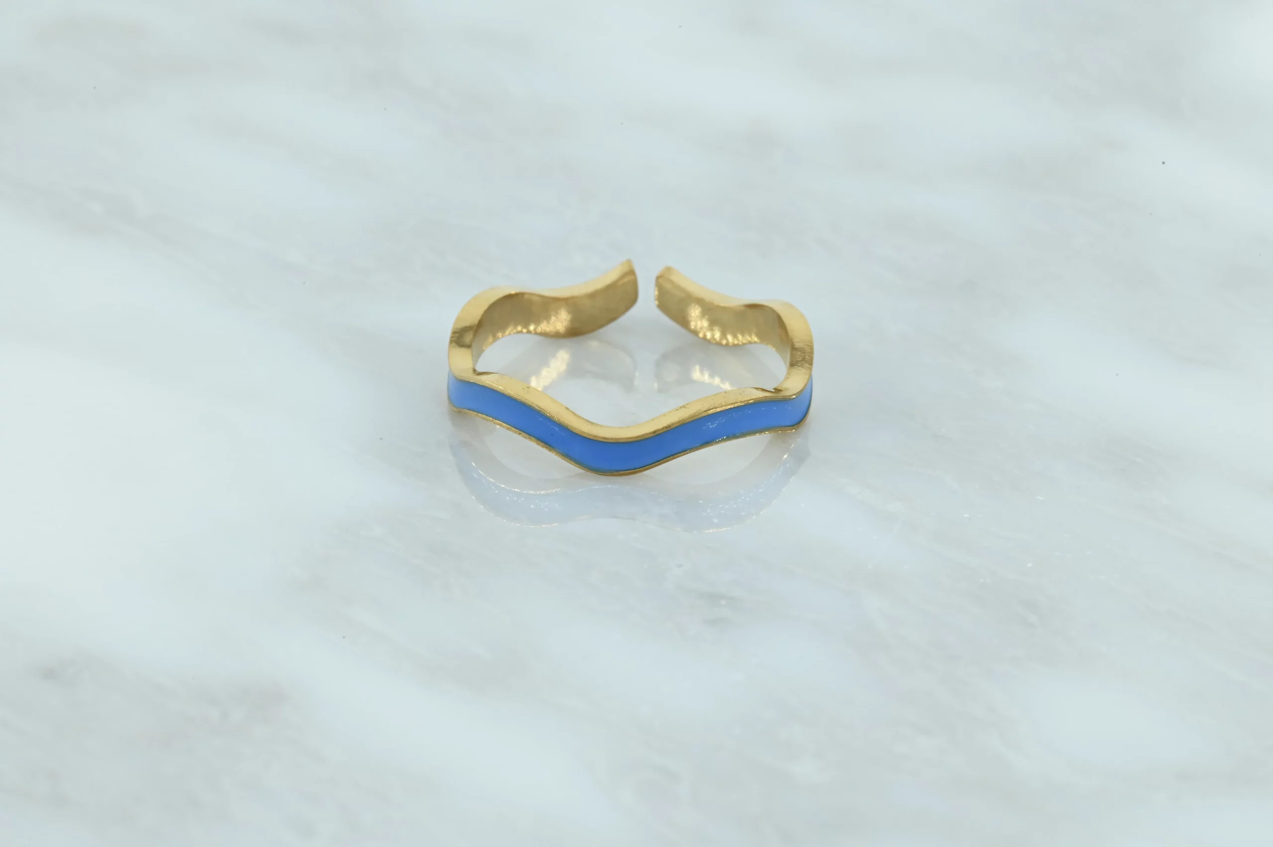 RVS blauwe fluoriserende golvende ring