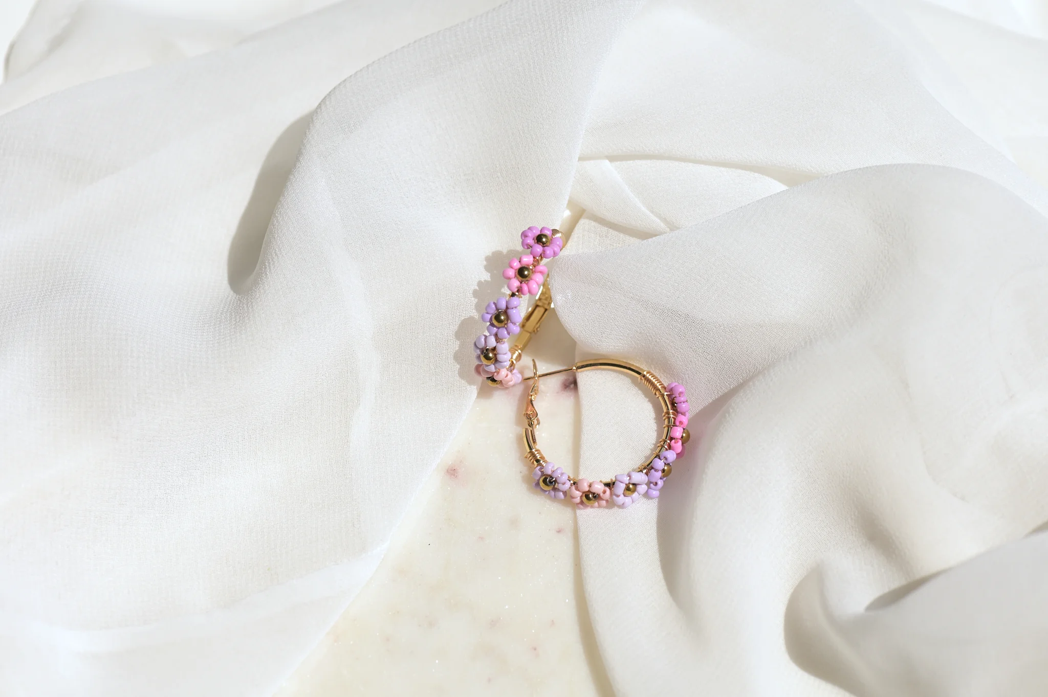 Creool  met roze/paarse bloemen