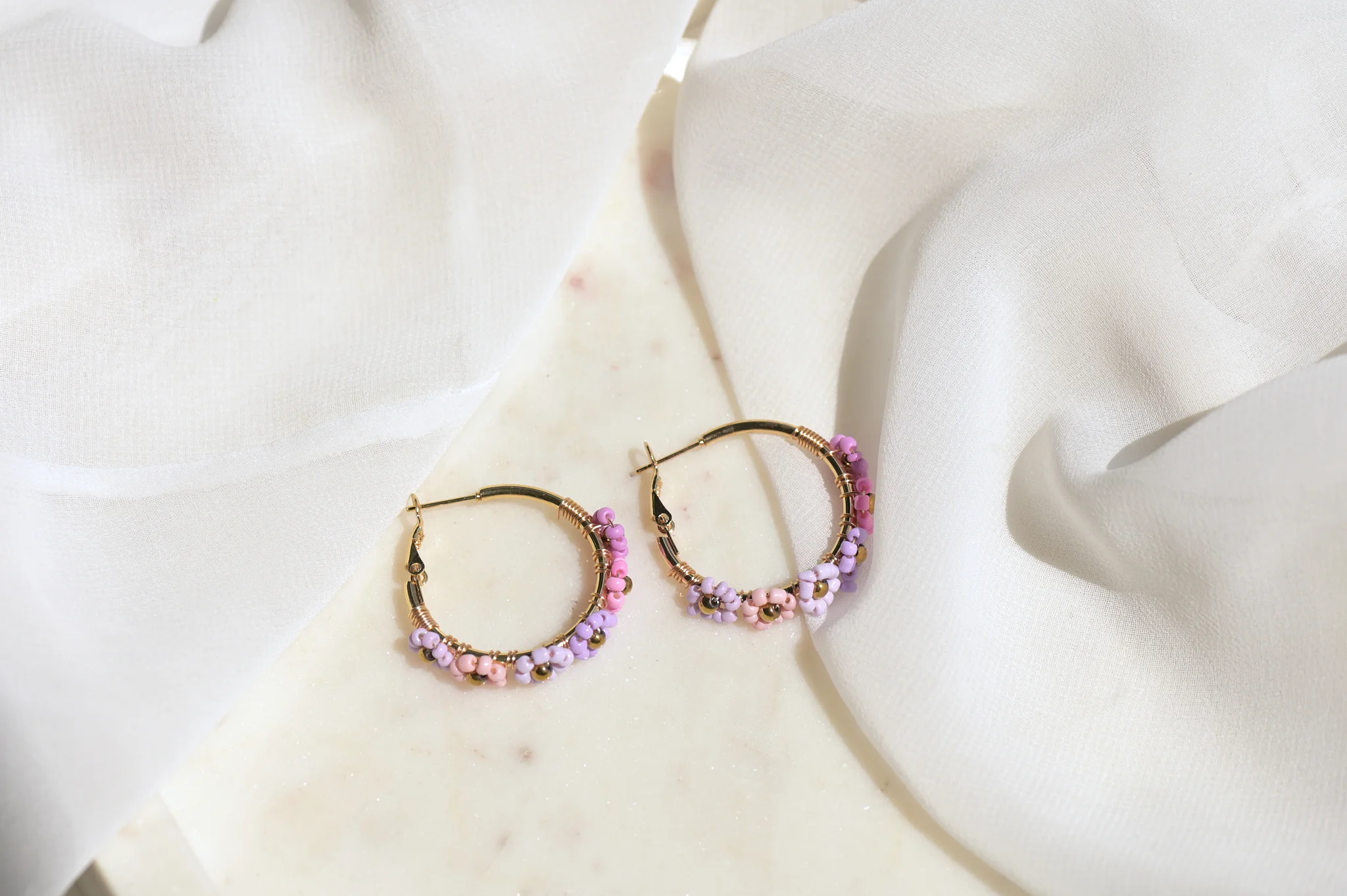 Creool  met roze/paarse bloemen